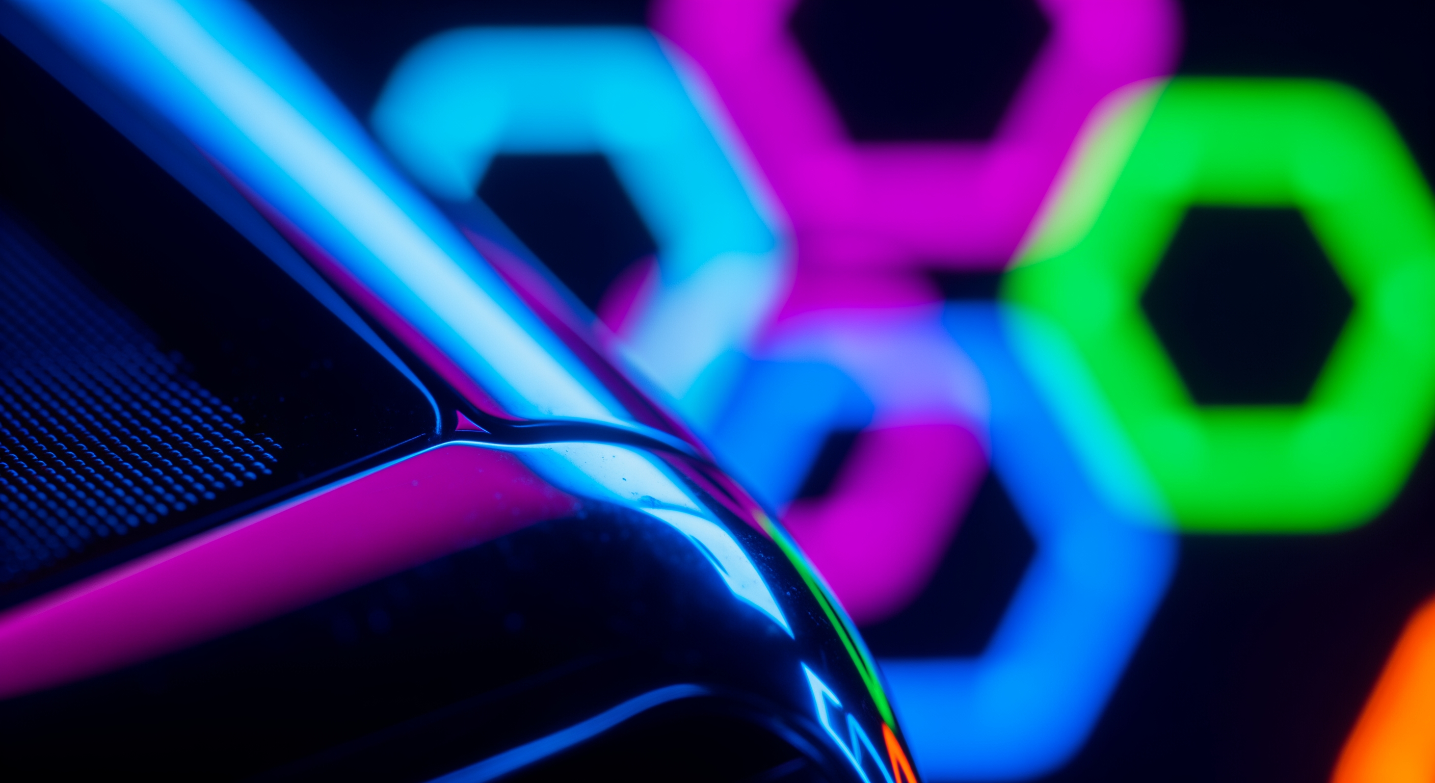 AI Design for Extreme macro photography focusing on the premium material textures of the flagship product. The composition is tight and artistic, capturing light reflections off the surface. Use a bold, high-contrast neon lighting palette to evoke an energetic, futuristic mood. The background is a soft-focus bokeh of vibrant geometric shapes, leaving significant clean space for future promotional copy. Focus on craftsmanship and tactile quality to attract a new audience.