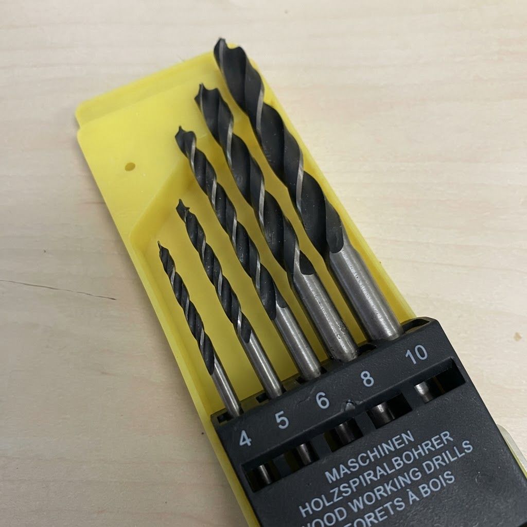 AI Design for create image which show drill bits in side the pack holes according to size number