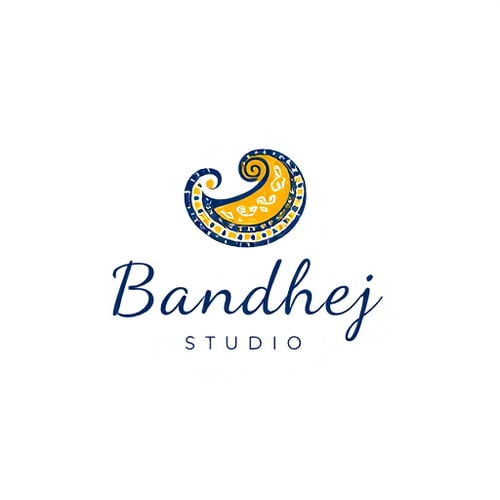 AI Design for Minimalist logo for a sari design company named "Bandhej Studio": Abstract representation of a paisley motif in a fluid, flowing form, symbolizing the drape of a sari and the intricate patterns of bandhej art. Color palette: Deep indigo, saffron yellow, and ivory white, evoking traditional Indian textiles and natural dyes. Typography: Elegant, hand-drawn script for "Bandhej Studio," with a slightly more modern sans-serif for "Studio." Design with an influence of traditional Indian block printing and contemporary art. Visual execution: Clean lines, subtle gradients, and a sense of organic movement. Background type: Clean white.