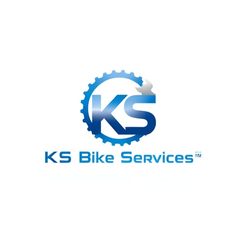 AI Design for Minimalist for a bicycle repair and maintenance business named "KS Bike Services": A stylized, abstract representation of a bicycle gear and a wrench interlocking, symbolizing repair and efficiency, Blue and silver, Clean and modern sans-serif, Bicycle industry and modern aesthetics, Flat design with subtle gradients, White.