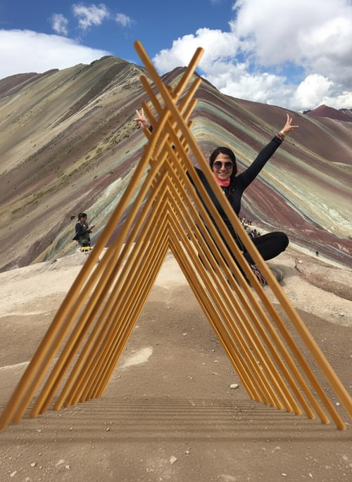 AI Design for Can you place the pavilion from the second image onto the first image so that the person is inside it?