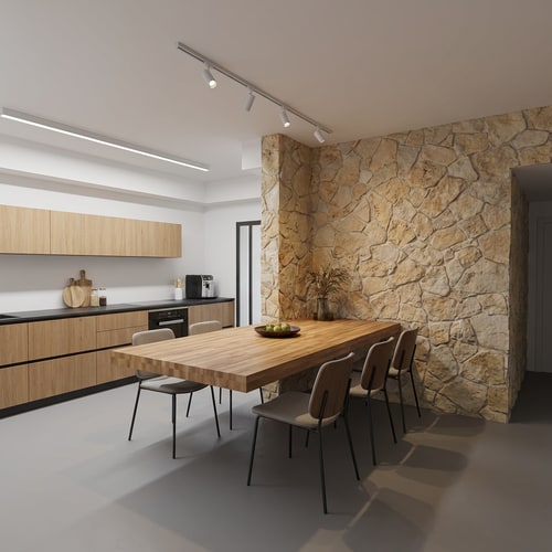 AI Design for s a dining area that we would like to redesign.
Currently, the butcher block counter is 90 cm high. We would like to lower it to 73 cm, similar to a standard dining table height.
We want to shorten the butcher block from the wall side that faces the TV wall. Almost the entire section on that side should be removed, leaving only a small extension of approximately 20 cm of butcher block surface facing the TV wall.
The solid front panel of the butcher block should also be removed. The butcher block surface should appear floating, with no closed front, allowing seating from all sides.
The lighting above the butcher block should be replaced with a track lighting system with adjustable spotlights.
The TV should be removed, along with the lighting elements currently installed on the TV wall.
The TV wall and the perpendicular wall next to it should be clad in stone, similar to the stone cladding used on the living room wall.
The kitchen should be redesigned to match the additional reference image provided.
All elements should be designed in a harmonious and cohesive style.