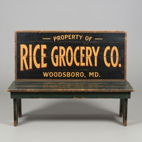 AI Design for A vintage wooden bench designed as an old general store advertising sign, perfectly front-facing (orthographic view, no perspective distortion). The bench looks symmetrical and centered. The top panel is clearly visible like a flat sign. Hand-painted vintage typography reads: “PROPERTY OF” (small, top), “RICE GROCERY CO.” (large, bold centerpiece in warm yellow/orange with red shading), and “WOODSBORO, MD.” (smaller below). The wood is aged and slightly worn with visible grain and distressed paint. Colors include dark green, black, and rustic tones. The bench legs are simple and visible beneath. Studio lighting, neutral background, highly detailed, realistic texture, no angle, straight-on view.