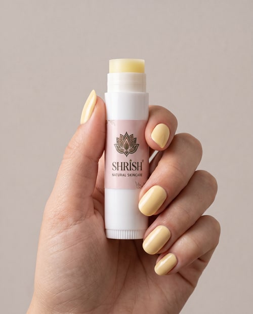 AI Design for close up cinematic product photo of the uploaded lip product held naturally in a female hand with the applicator removed and the visible next to the bottle the nails are really manicured and painted in the same colour has the lip product shade clean plain Studio background soft Beauty Studio lighting minimal composition sharp product  focus realistic skin texture premium cosmetic advertisement size give the uploaded product exactly as as it is do not change the product shspde design packaging cap logo label colour