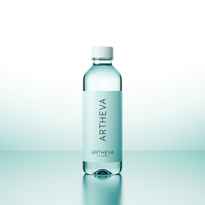 Create a high-end studio product image of an ARTHEVA packaged drinking water bottle, standing upright on a subtle reflective surface. Bottle design is clean and modern with soft aqua-blue tones, transparent PET bottle, minimal typography, and a matte white cap. Background is light gradient (white to pale aqua), soft studio lighting from both sides, gentle reflections, no harsh shadows. Label design uses thin serif + modern sans font combination, premium spacing, no clutter. Overall feel: pure, calm, clinical-grade cleanliness. 4K, commercial photography style, print-ready.