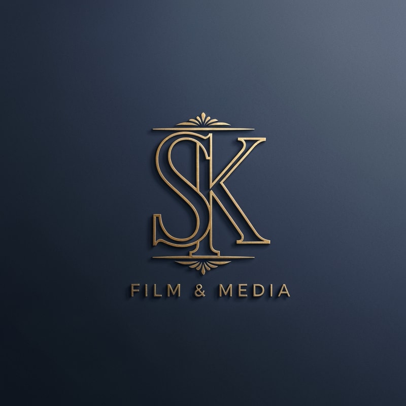 Design a classic monogram logo for SK Film & Media with intertwined S and K in a refined style. Use deep navy blue with gold accents. Slight texture, minimal lighting, old-Hollywood elegance.