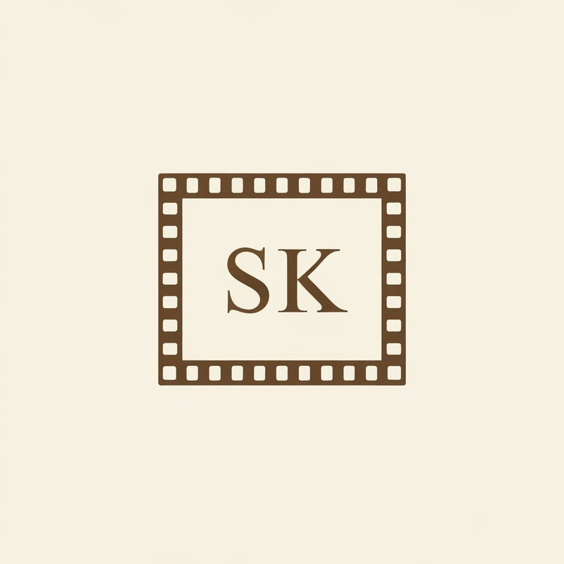 Design a classic logo where SK sits inside a traditional film frame border. Use subtle warm colors like antique gold, bronze, and cream. Clean, classy, old-school cinema vibe