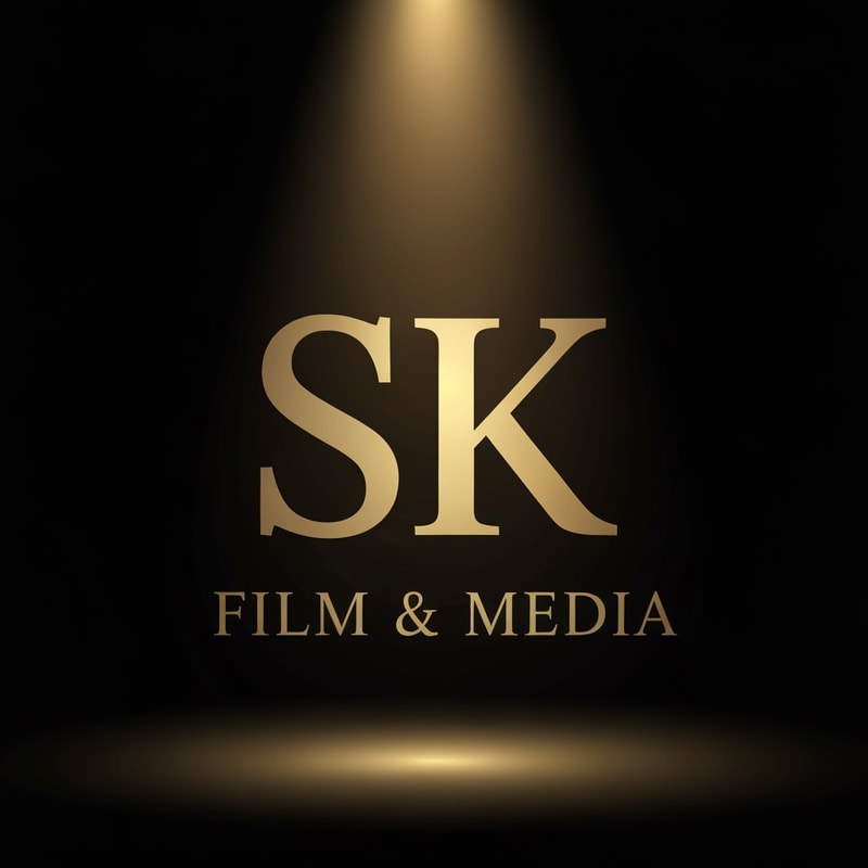 Create a classic-style logo for SK Film & Media where a soft golden spotlight illuminates the letters SK. Dark background, warm gold highlights, subtle depth, vintage theater feel