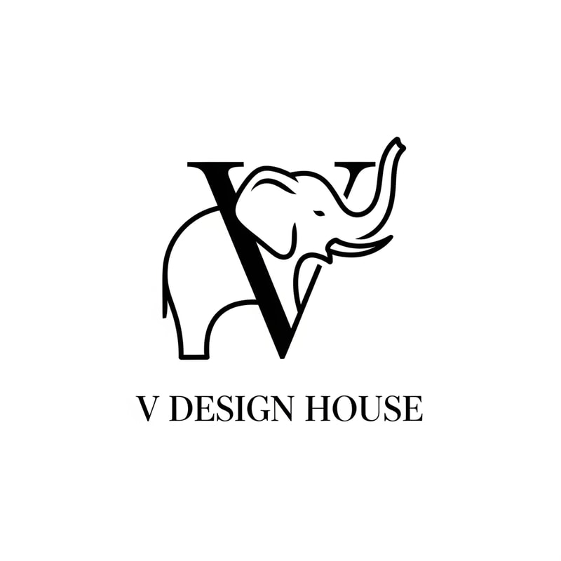 A stylized elephant outline forming the letter “V”

Thin, elegant lines

Elephant trunk curved upward (symbol of luck & prosperity)

Text below:

V Design House

Font style: Modern serif (luxury look)