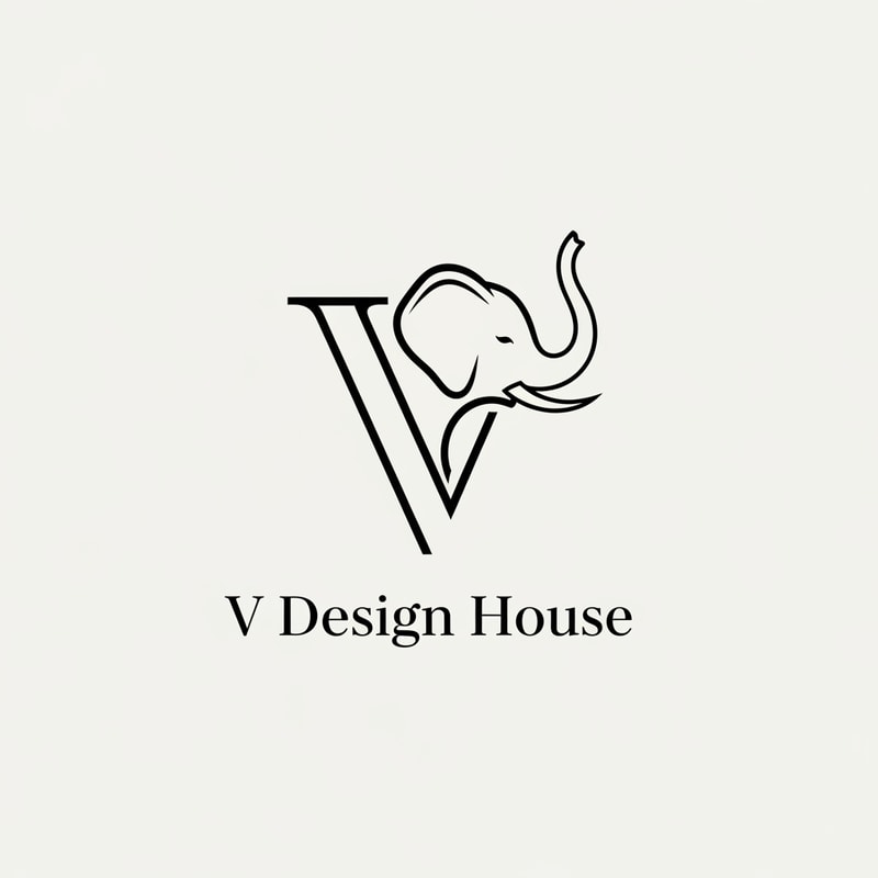 A stylized elephant outline forming the letter “V”
A stylized elephant outline forming the letter “V”

Thin, elegant lines

Elephant trunk curved upward (symbol of luck & prosperity)

Text below:

V Design House

Font style: Modern serif (luxury look)
Thin, elegant lines



Text below:

V Design House

Font style: Modern serif (luxury look)