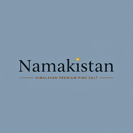 Professional logo design. “Generate a minimal and luxury logo for Namakistan with the tagline Himalayan Premium Pink Salt. Focus on creative typography, making the text the hero of the design. Add a subtle detail such as a salt crystal dot on the letter ‘i’ or a thin underline in #f8cdc7. The style should be simple, elegant, and perfect for high-end product packaging.”