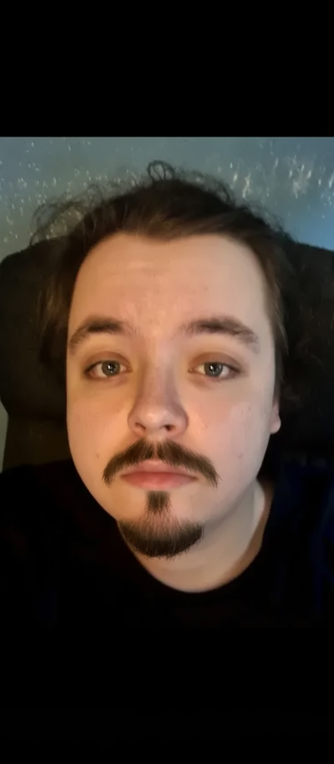 give him a goatee and moustache