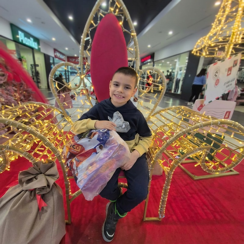 blur the background. let the boy be in focus and enhance quality of photo