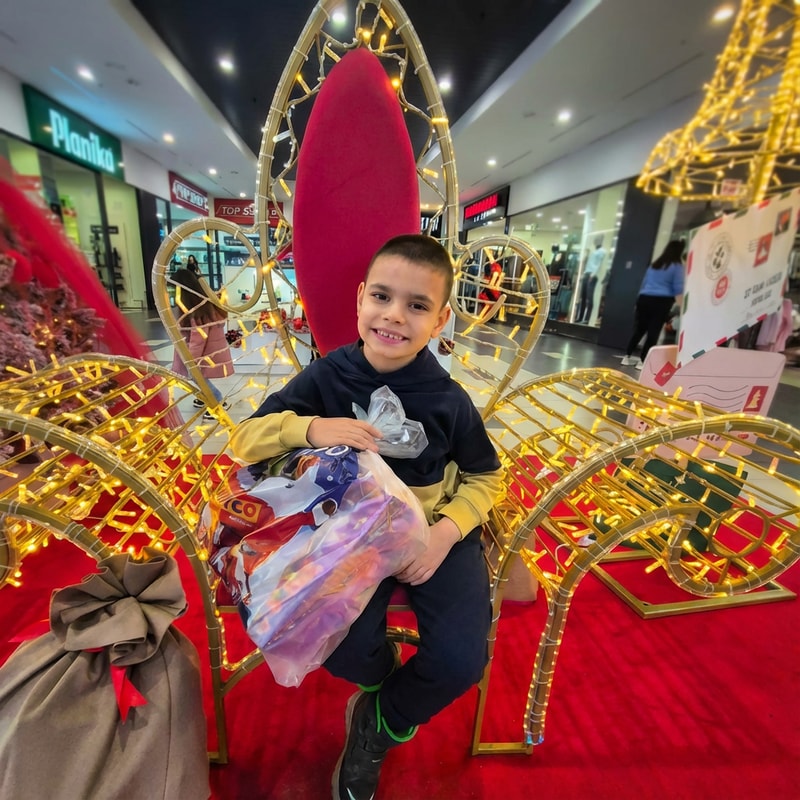 blur more the background. let the boy be in focus and enhance quality of photo