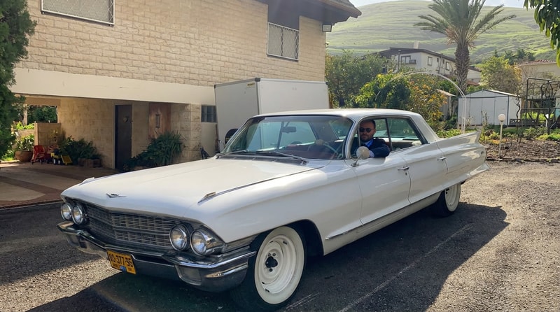 MAKE THIS MAN THE DRIVER OF THIS CAR, the whole car in the photo