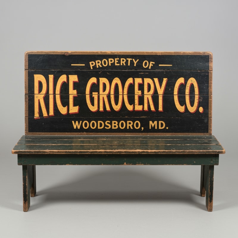 A vintage wooden bench designed as an old general store advertising sign, perfectly front-facing (orthographic view, no perspective distortion). The bench looks symmetrical and centered. The top panel is clearly visible like a flat sign. Hand-painted vintage typography reads: “PROPERTY OF” (small, top), “RICE GROCERY CO.” (large, bold centerpiece in warm yellow/orange with red shading), and “WOODSBORO, MD.” (smaller below). The wood is aged and slightly worn with visible grain and distressed paint. Colors include dark green, black, and rustic tones. The bench legs are simple and visible beneath. Studio lighting, neutral background, highly detailed, realistic texture, no angle, straight-on view.