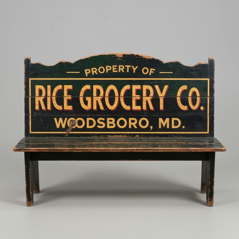 A vintage wooden bench designed as an old general store advertising sign, perfectly front-facing (orthographic view, no perspective distortion). The bench looks symmetrical and centered. The top panel is clearly visible like a flat sign. Hand-painted vintage typography reads: “PROPERTY OF” (small, top), “RICE GROCERY CO.” (large, bold centerpiece in warm yellow/orange with red shading), and “WOODSBORO, MD.” (smaller below). The wood is aged and slightly worn with visible grain and distressed paint. Colors include dark green, black, and rustic tones. The bench legs are simple and visible beneath. Studio lighting, neutral background, highly detailed, realistic texture, no angle, straight-on view.