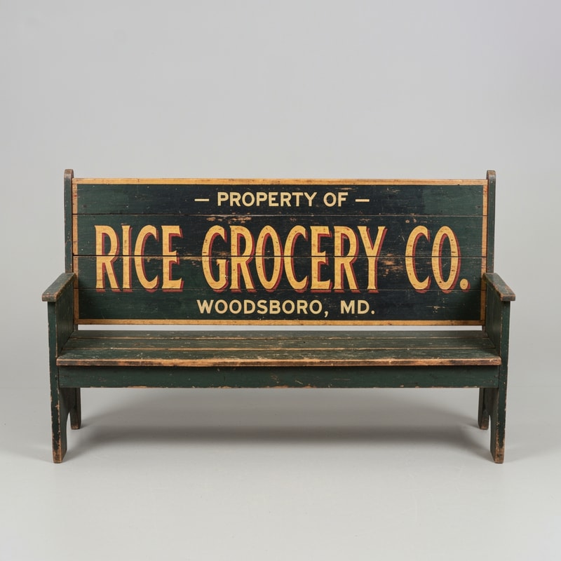 A vintage wooden bench designed as an old general store advertising sign, perfectly front-facing (orthographic view, no perspective distortion). The bench looks symmetrical and centered. The top panel is clearly visible like a flat sign. Hand-painted vintage typography reads: “PROPERTY OF” (small, top), “RICE GROCERY CO.” (large, bold centerpiece in warm yellow/orange with red shading), and “WOODSBORO, MD.” (smaller below). The wood is aged and slightly worn with visible grain and distressed paint. Colors include dark green, black, and rustic tones. The bench legs are simple and visible beneath. Studio lighting, neutral background, highly detailed, realistic texture, no angle, straight-on view.