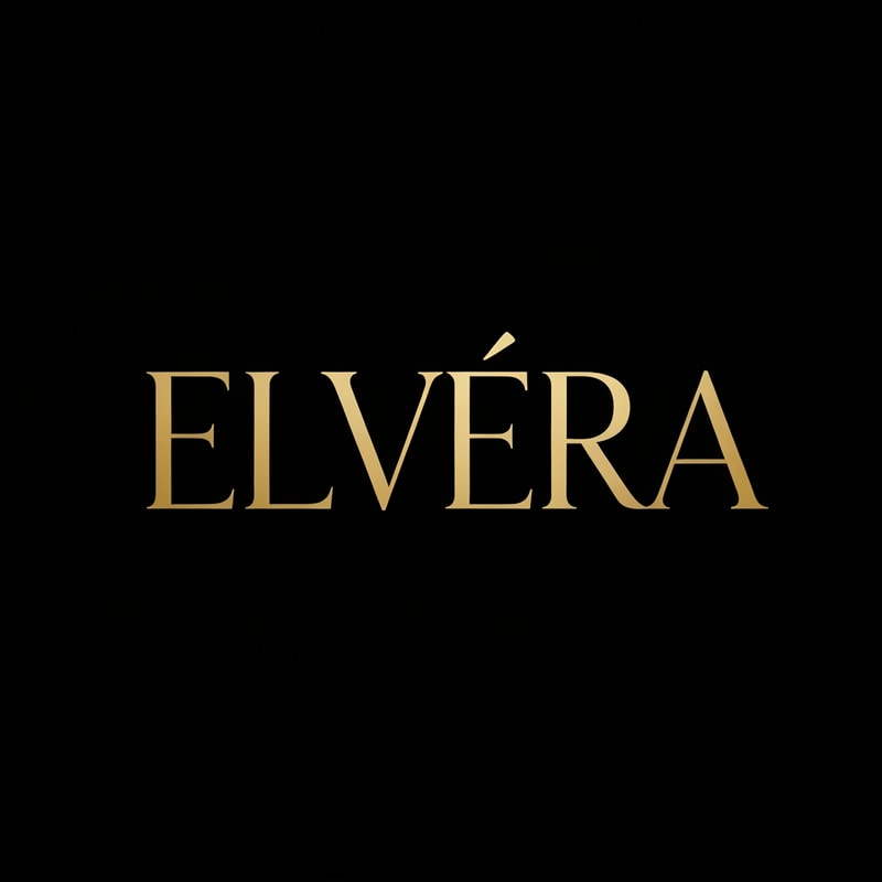 Create a high-end luxury logo for "Elvéra". 
Use gold typography on a matte black background. 
Elegant serif font, slightly spaced letters. 
Style inspired by premium cosmetic brands, minimal, bold, and sophisticated. 
No extra elements, focus on typography.