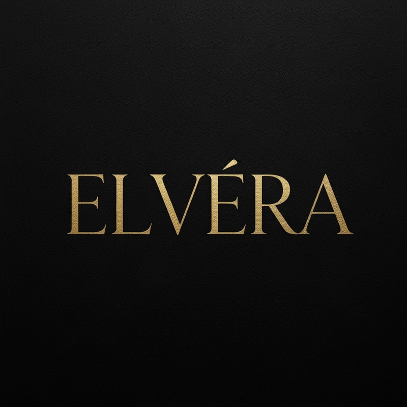 Create a high-end luxury logo for "Elvéra". 
Use gold typography on a matte black background. 
Elegant serif font, slightly spaced letters. 
Style inspired by premium cosmetic brands, minimal, bold, and sophisticated. 
No extra elements, focus on typography.